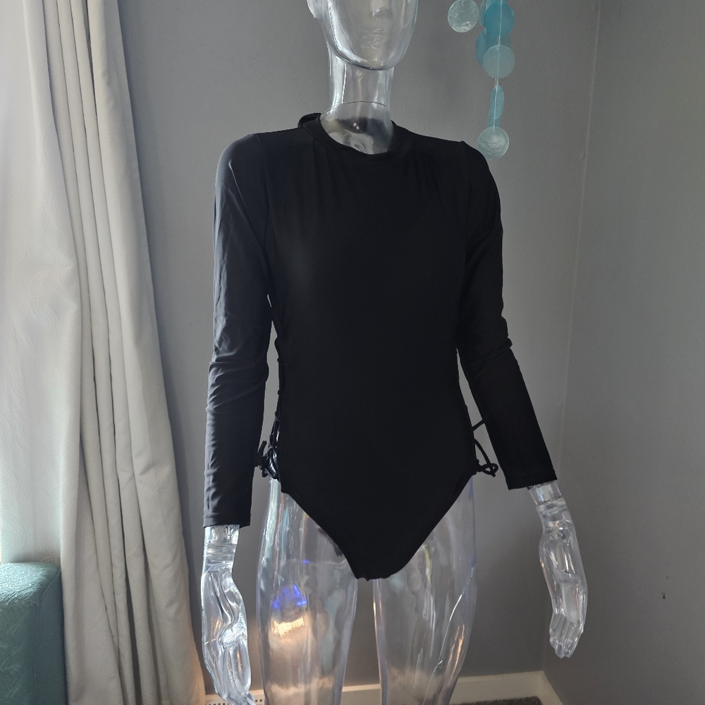 Solid Color Criss Cross Side Lace Up Open Back Long Sleeve One Piece Swimsuit